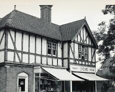 LHG02_0035 Shops at corner of Mill Lane. Note that the sop on the corner was still a haberdashery at this time.