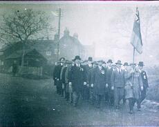 S3510 Remembrance Day Parade passing the end of Mill Lane